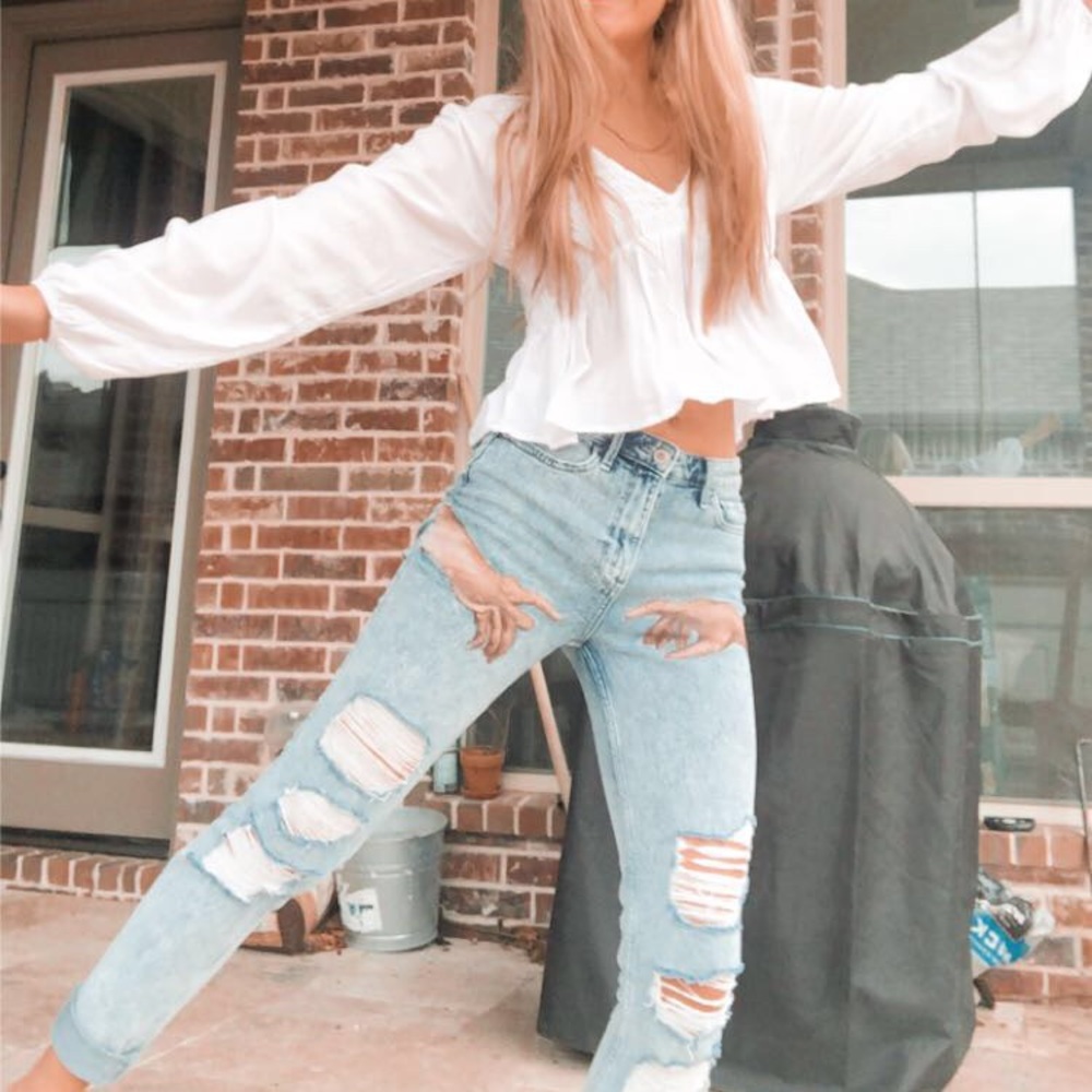 Vintage looking jeans with hand painted hands